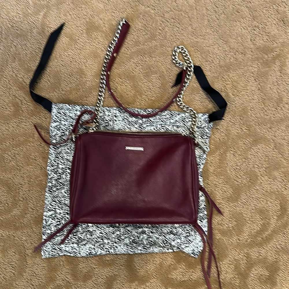 Jessica Mikhoff zip maroon leather convertible bag